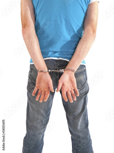 Obraz man with handcuffs on his back
