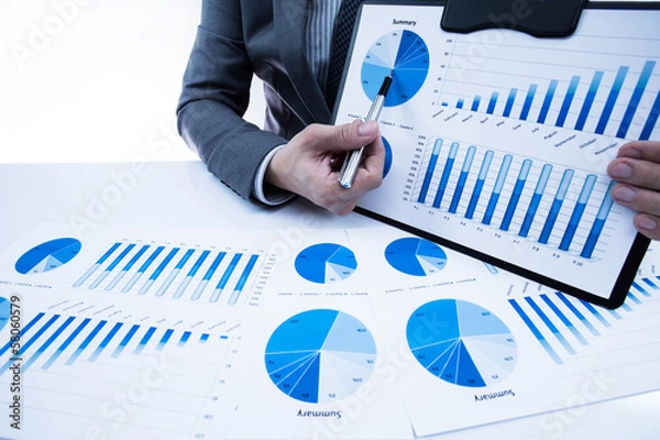 Obraz man hand with business report