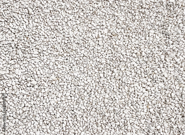 Fototapeta Natural background. Background of white sea stones. Marble chips. White pebbles. View from above. Natural stone background. Copy space