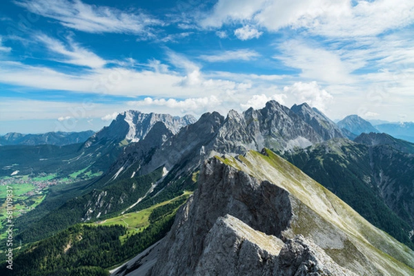 Fototapeta Wild alpine landscape with rocky mountains above Ehrwald at a beautfiful summer day. View to Zugspitze and Mieminger Kette, Tirol, Austria