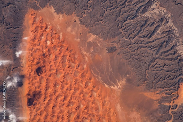 Fototapeta Sahara Desert in Algeria aerial view. Earth landscape. Selective focus included. Elements of this image furnished by NASA. Selective focus included.