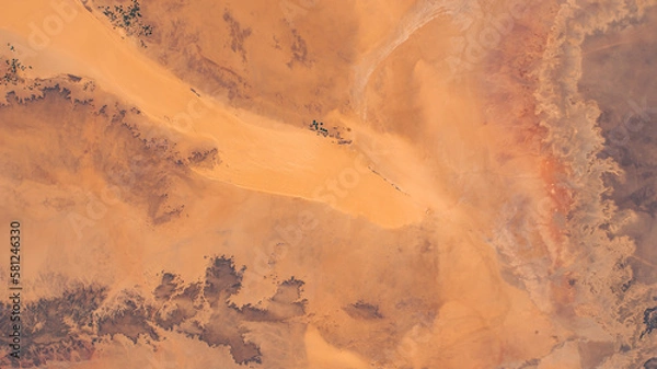 Fototapeta Sahara Desert in Algeria aerial view. Earth landscape. Selective focus included. Elements of this image furnished by NASA.