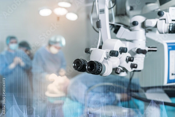 Fototapeta Surgical microscope in operating room with doctors. Ophthalmological clinic. Microsurgical optical equipment