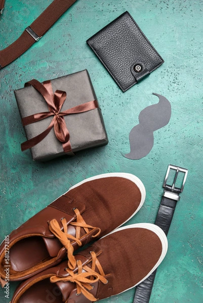 Obraz Male shoes, accessories, paper mustache and gift for Father's Day celebration on color background