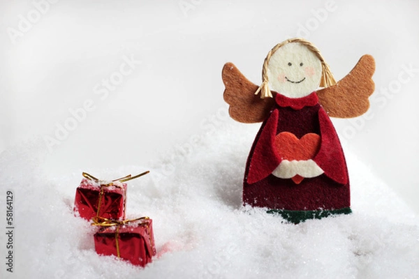 Fototapeta Weihnachtsdeko - ein Engel und Weihnachtsgeschenke