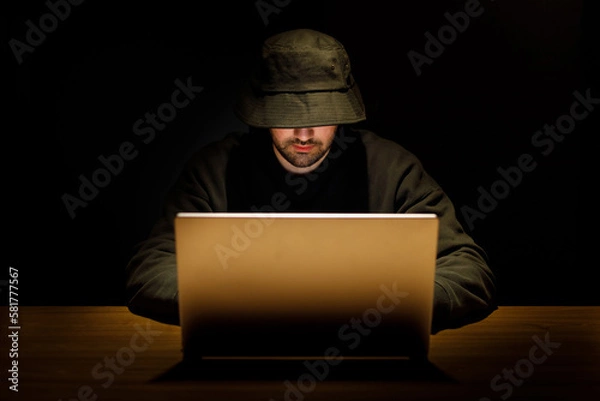 Fototapeta Payments System Hacking. Online Credit Cards Payment Security Concept. Hacker in Black. Hacking the System