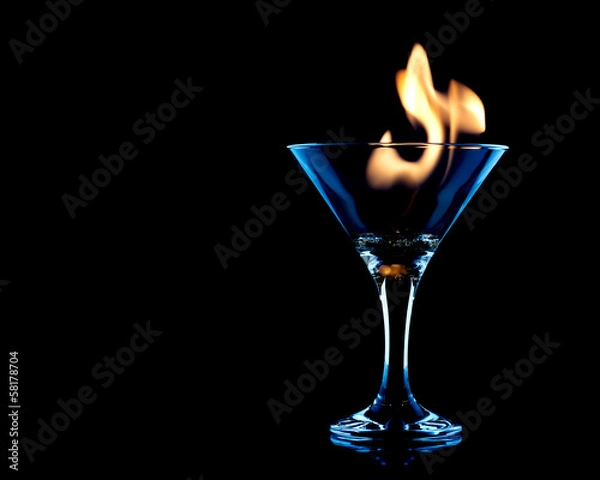 Obraz Flamer Cocktail over black on the glass