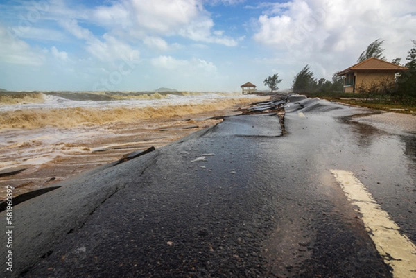 Obraz Road damage caused by sea waves erode