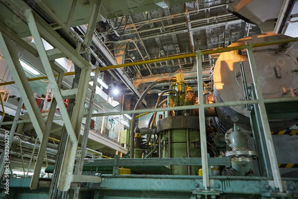 Obraz Ship's engine room. Vessel's ( Ship ) Engine Room Space / industrial stairs. Ship's Engine Heavy Machinery Space - Pipes, Valves, Engines