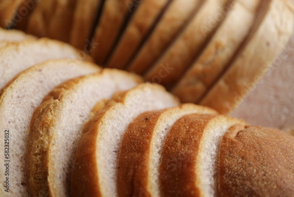 Obraz スライスしたパン　ブレッド　ベーカリー　背景素材　軽食　アップ　接写