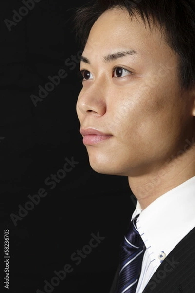 Fototapeta ビジネスマン,黒バック