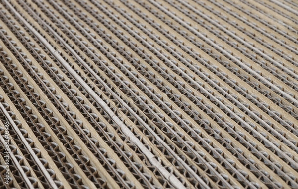 Fototapeta Cardboard cartons corrugated fiberboard paper boards for boxes. Packing concept macro photo