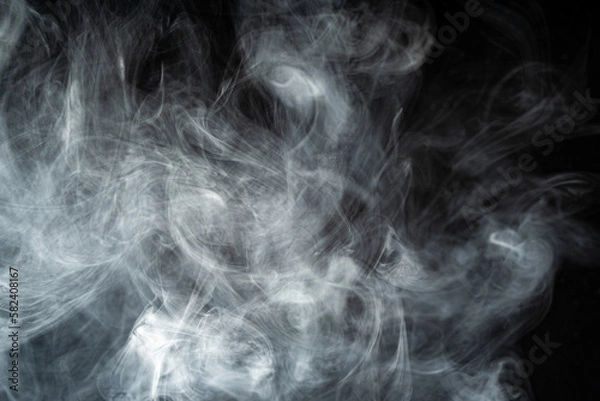 Fototapeta 黒い背景に白い煙