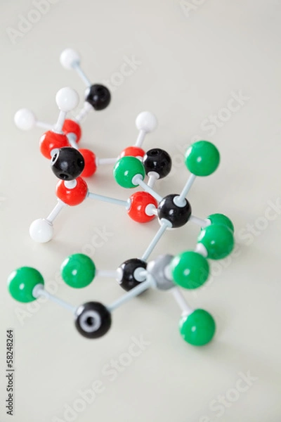 Fototapeta Molecular Structure On Desk In Classroom