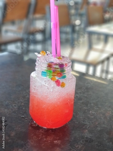Obraz cocktail with ice and straw
