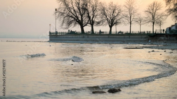 Fototapeta Small waves on Lake Constance on the coast of Friedrichshafen