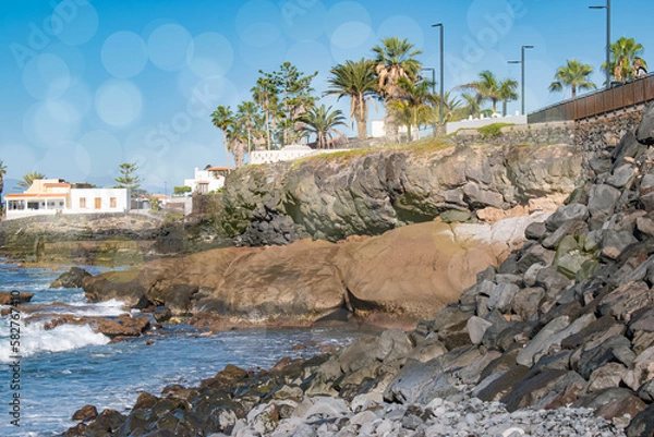 Fototapeta view of the coast of the sea. rocky cliff of the sea, volcanic rocks