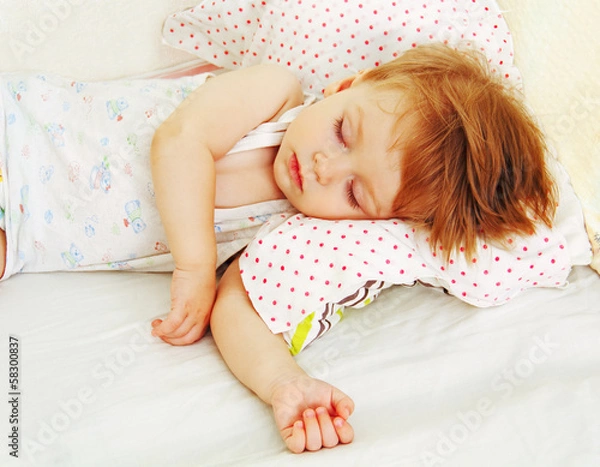 Fototapeta baby in bed.