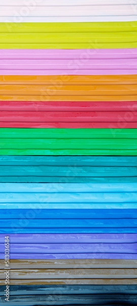 Fototapeta Background of multi-colored plasticine. Bright background for the designer Vertical web banner