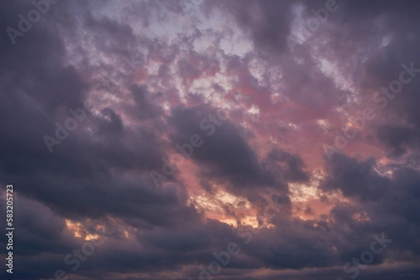 Obraz dramatic clouds at the sunset