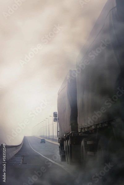 Fototapeta Air pollution crisis in city from truck exhaust pipe on road.Smog and  air pollution from particle PM2.5