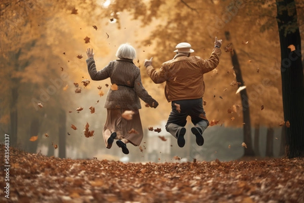 Obraz happy elderly couple jumping in the park autumn, leaves AI Generative
