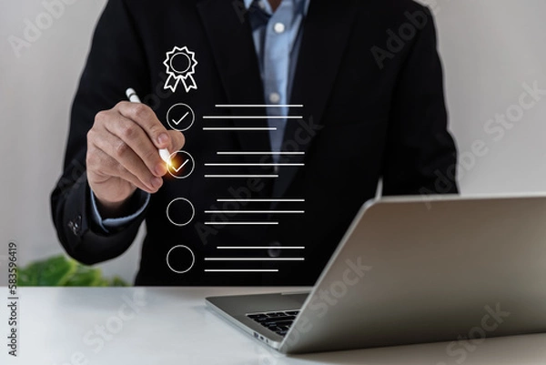 Fototapeta Businessman using pen tick or check mark concept, verification account, paperless workplace, online document management, electronic document, cyber security, contract, satisfaction, virtual screen.