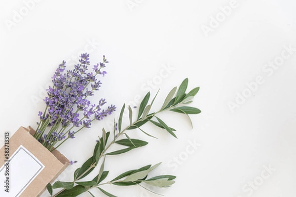 Obraz Lavender product presentation. Lavender flowers on a white background. Top view concept.
