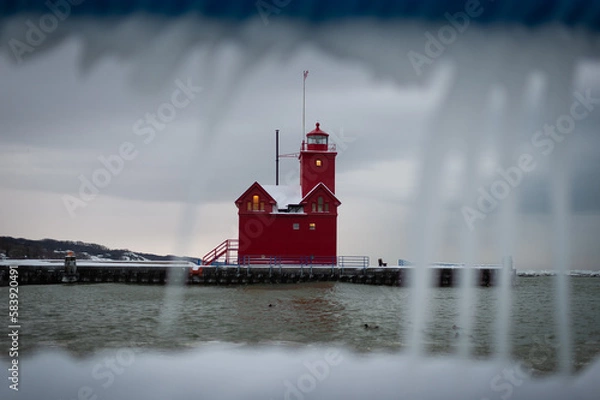 Fototapeta lighthouse through icicles