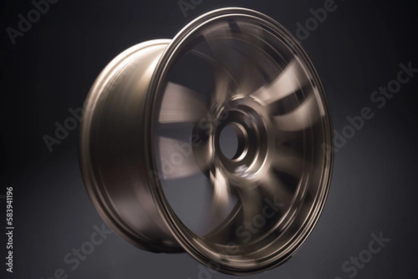 Fototapeta sports matte bronze car rims photography at various long exposures for the effect of motion blur when rotating