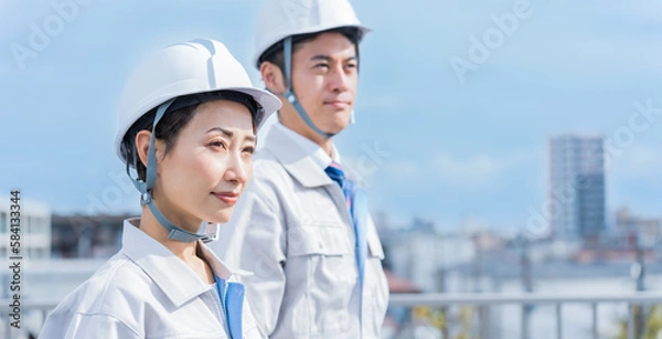 Fototapeta ヘルメットを被った日本人男女