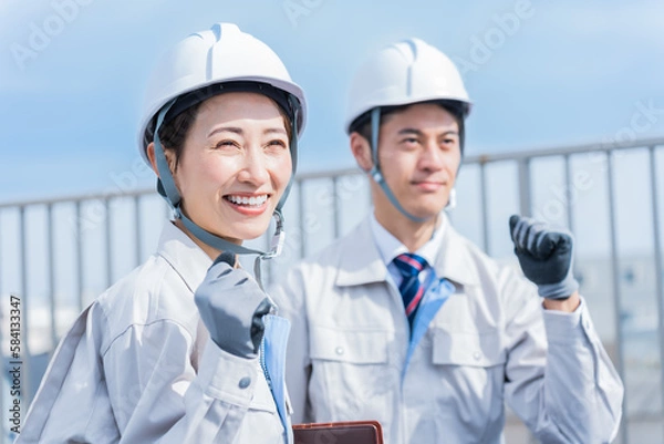 Fototapeta ヘルメットを被った日本人男女