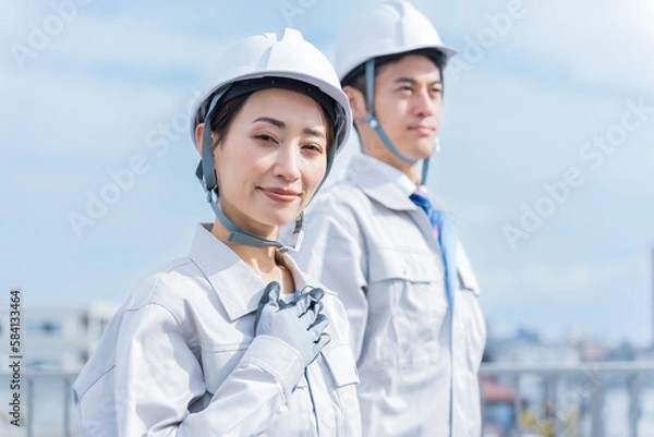 Fototapeta ヘルメットを被った日本人男女