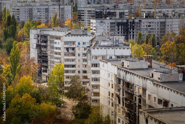 Obraz Destroyed and burned multi-apartment residential buildings after rocket attack. Residential area Saltivka in Kharkiv city, Ukraine. Russian War against Ukraine