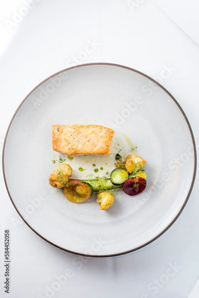 Obraz fine dining dinner with fish and vegetables