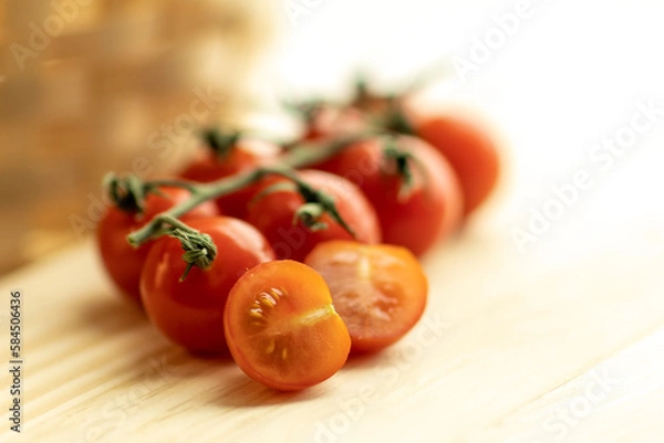 Obraz tomatoes on a wooden table