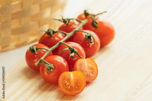Obraz tomatoes on a wooden table
