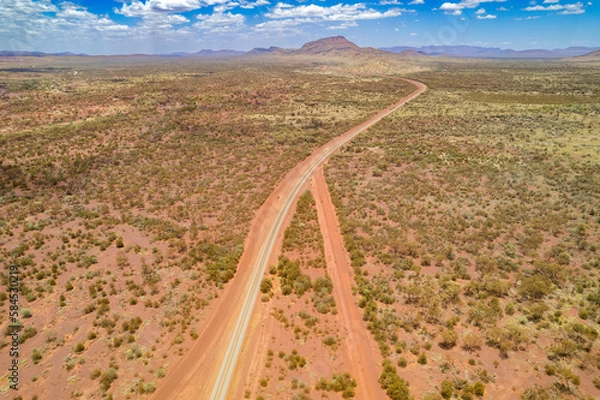 Obraz Looking down at intersecting dirt tracks at the red terrain earth in outback Australia