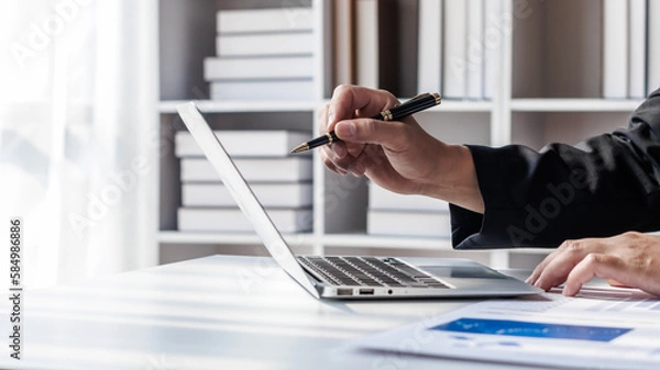 Fototapeta Businessman, financial auditor and secretary doing balance calculation report The Revenue Department checks the documents. Audit concept
