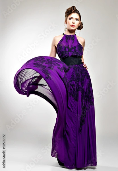 Fototapeta Beautiful fashion woman in violet long dress