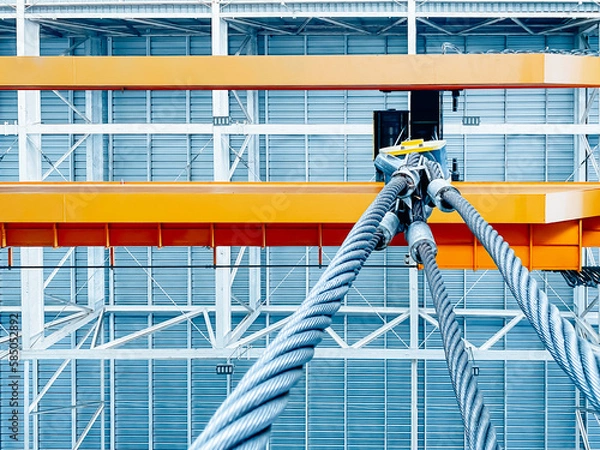 Fototapeta Overhead crane inside factory building, industrial background.