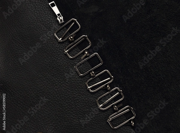 Fototapeta black leather background with fittings