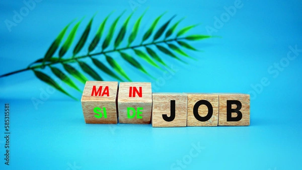 Fototapeta Main or side job symbol. Turned wooden cubes and changed concept words Side job to Main job. Blue background with beautiful palm leaves. Business side or main job concept.Main or side job symbol. Turn