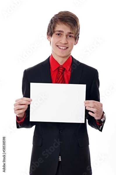 Fototapeta Young businessman holds the paper in front of him.