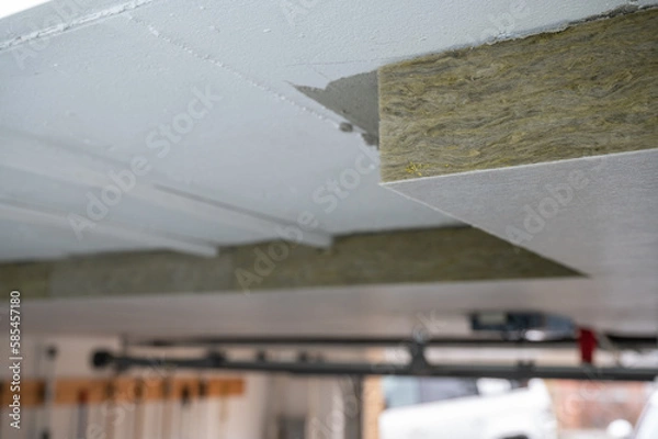 Fototapeta Insulation panels made of mineral wool, which were glued under a basement ceiling