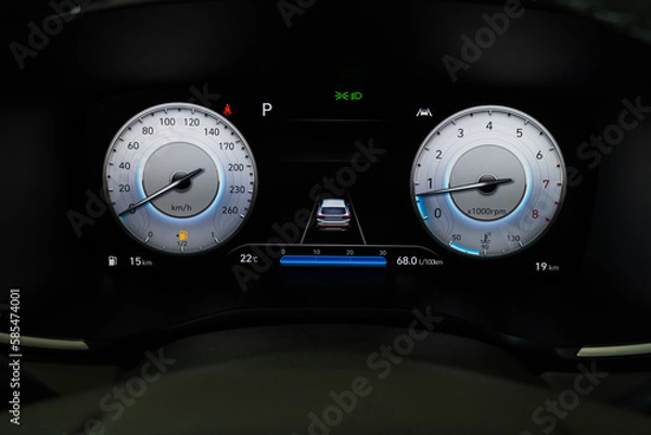 Fototapeta Close up shot of digital speedometer  in modern car console. Console panel of the car.