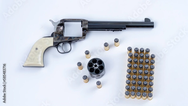 Fototapeta Wild west handgun with revolver removed and bullets