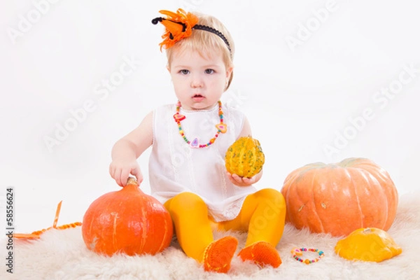 Fototapeta Baby girl with pumpkin