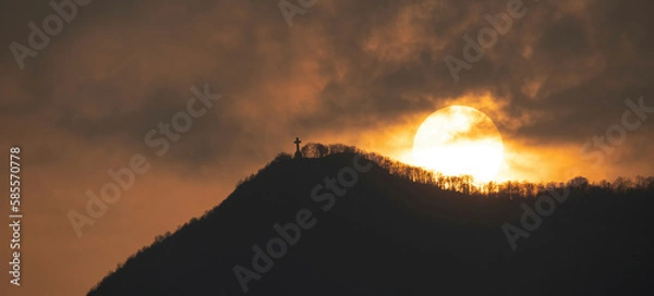 Obraz Image of the cross on top of Mount Musinè with a sun frame 