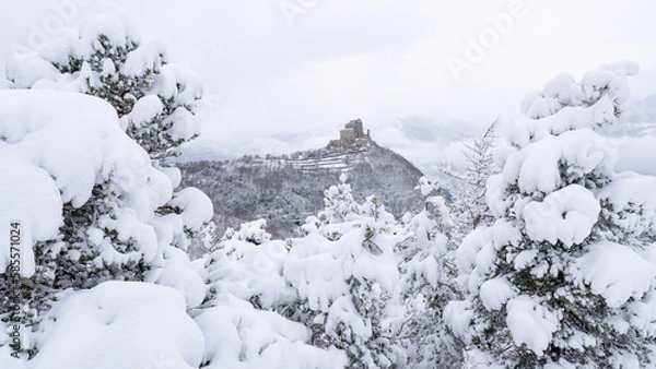 Obraz Image of the Ancient/ Abbey of San Michele built on Mount Pirchiriano located at the entrance of the Susa Valley, around the years between 983 and 987 A.D. with an abundant snowfall